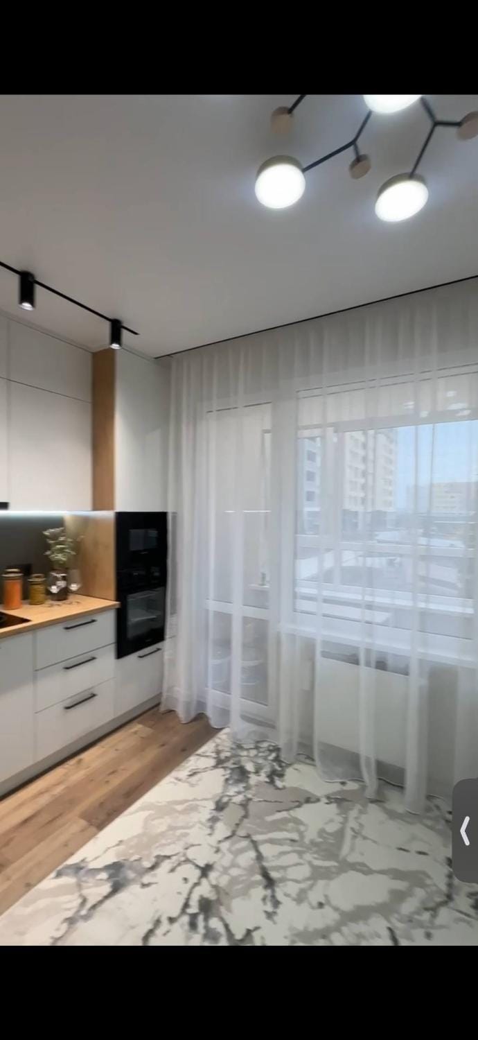 Уютная квартира с современным евроремонтом в центре города, рядом с метро Apartment in Almaty