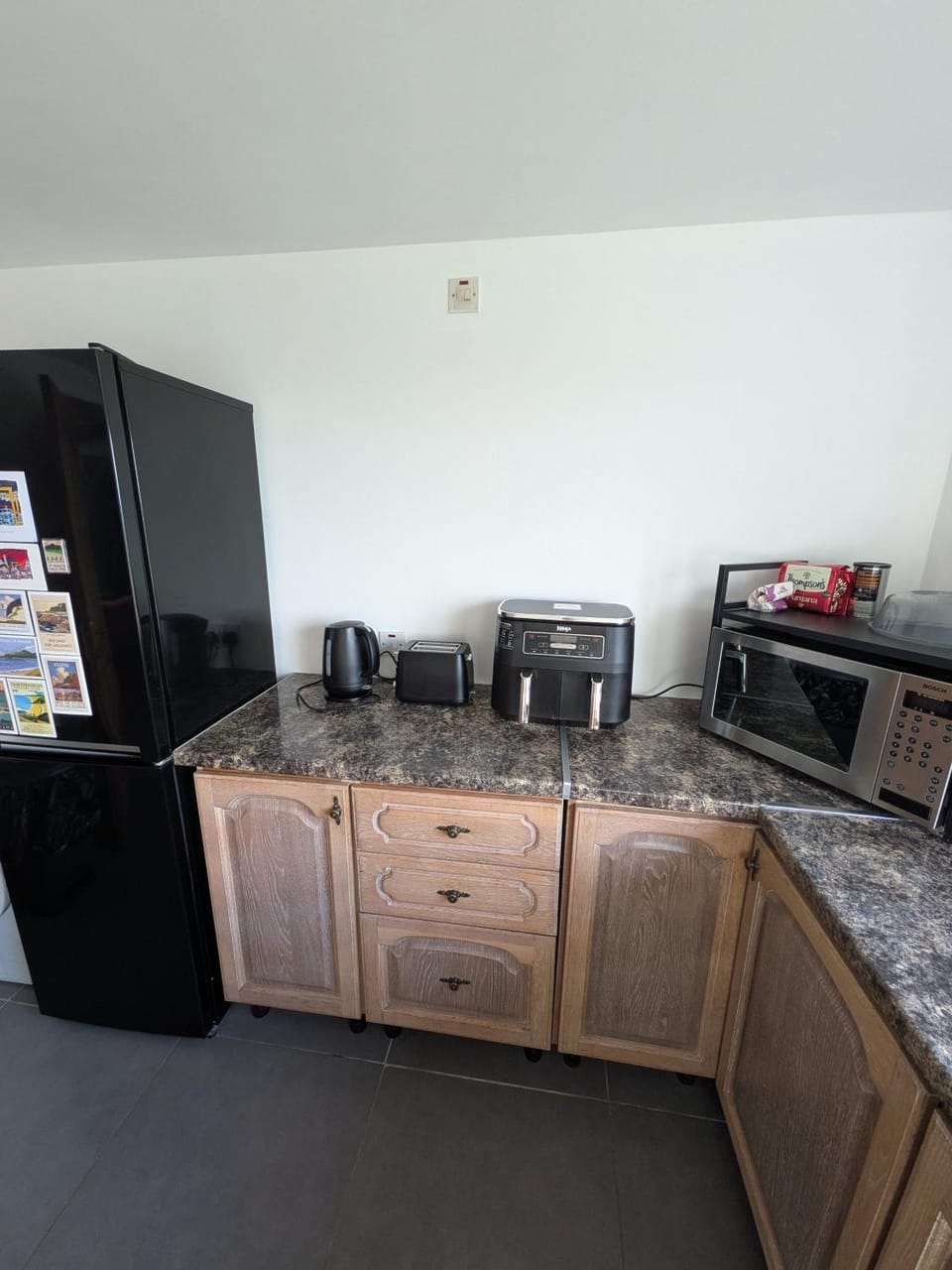 Kitchen or kitchenette, microwave, toaster