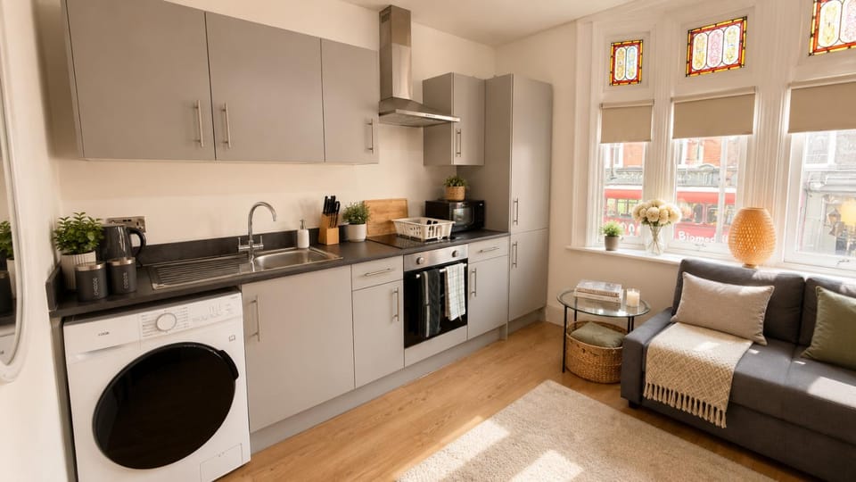 Kitchen or kitchenette, Living room, Seating area, Dining area, dishwasher, oven, stove, toaster, washing machine, dryer