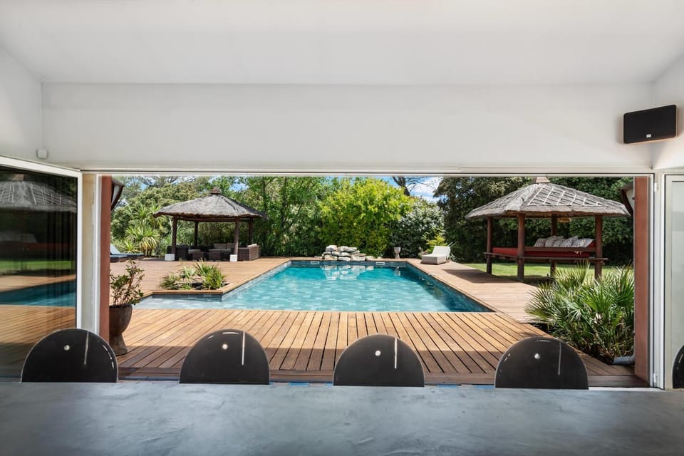 Property building, Living room, Swimming pool