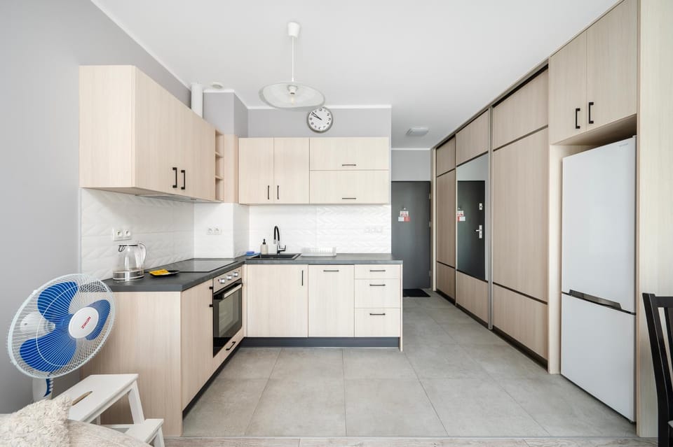 Kitchen or kitchenette, dishwasher, oven, stove