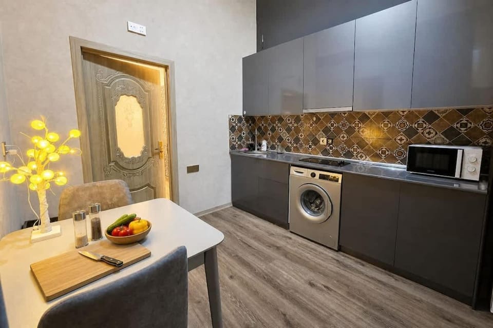 Bright flat near Boulevard & Old City Apartment in Baku