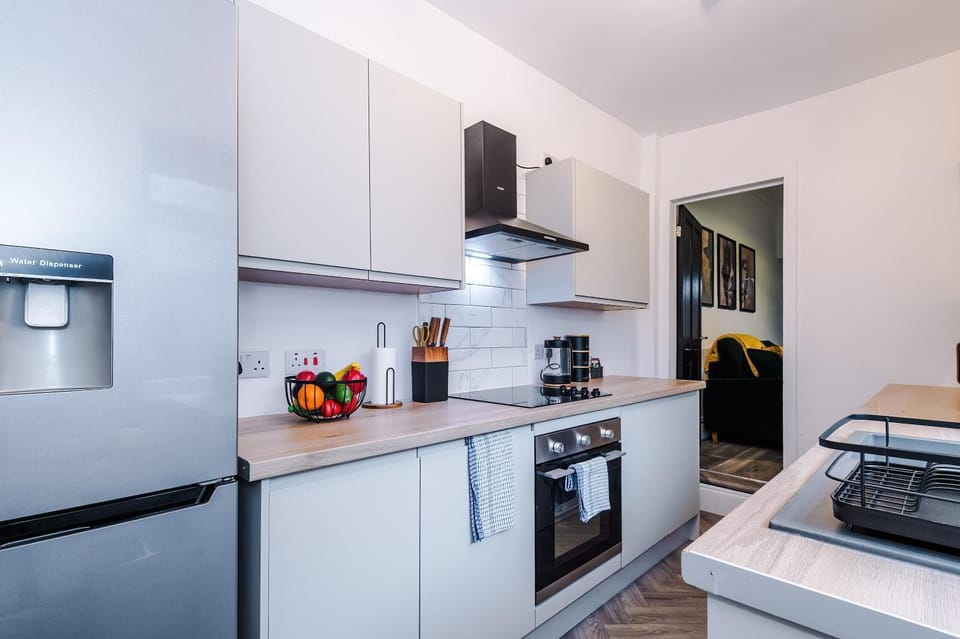Kitchen or kitchenette, oven, stove, toaster