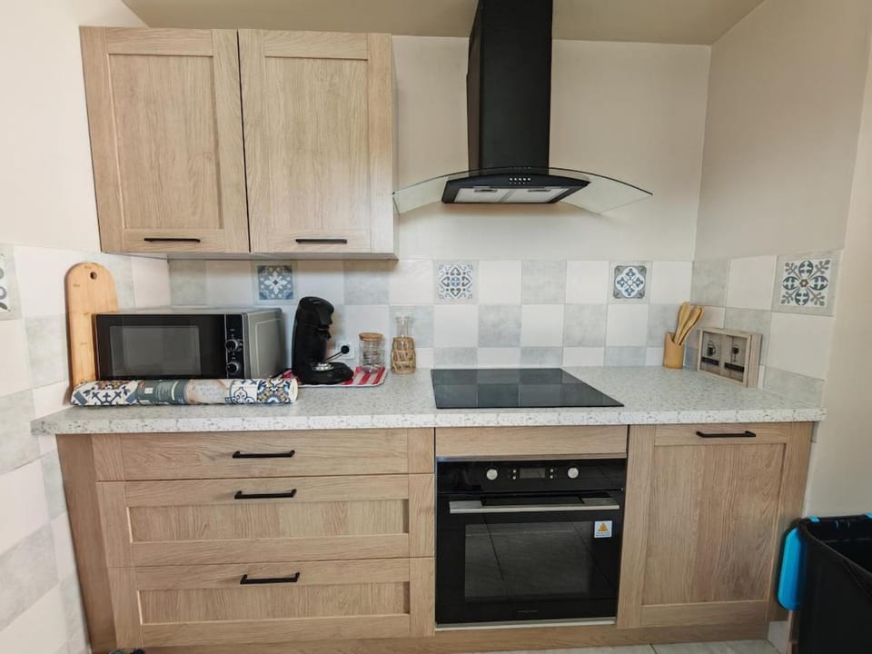 Kitchen or kitchenette, stove