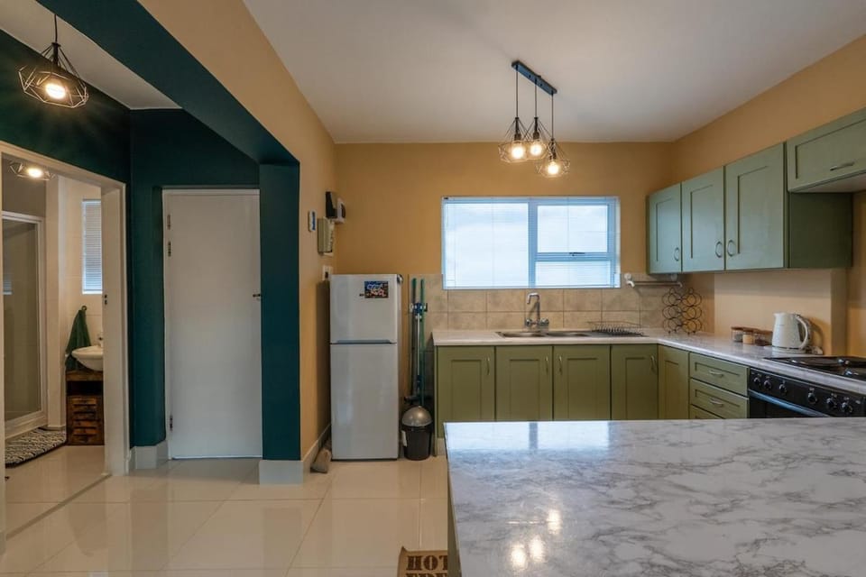 Kitchen or kitchenette, oven, stove