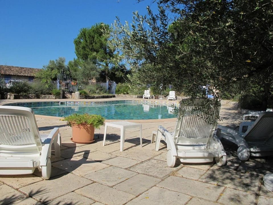 Property building, Living room, Swimming pool
