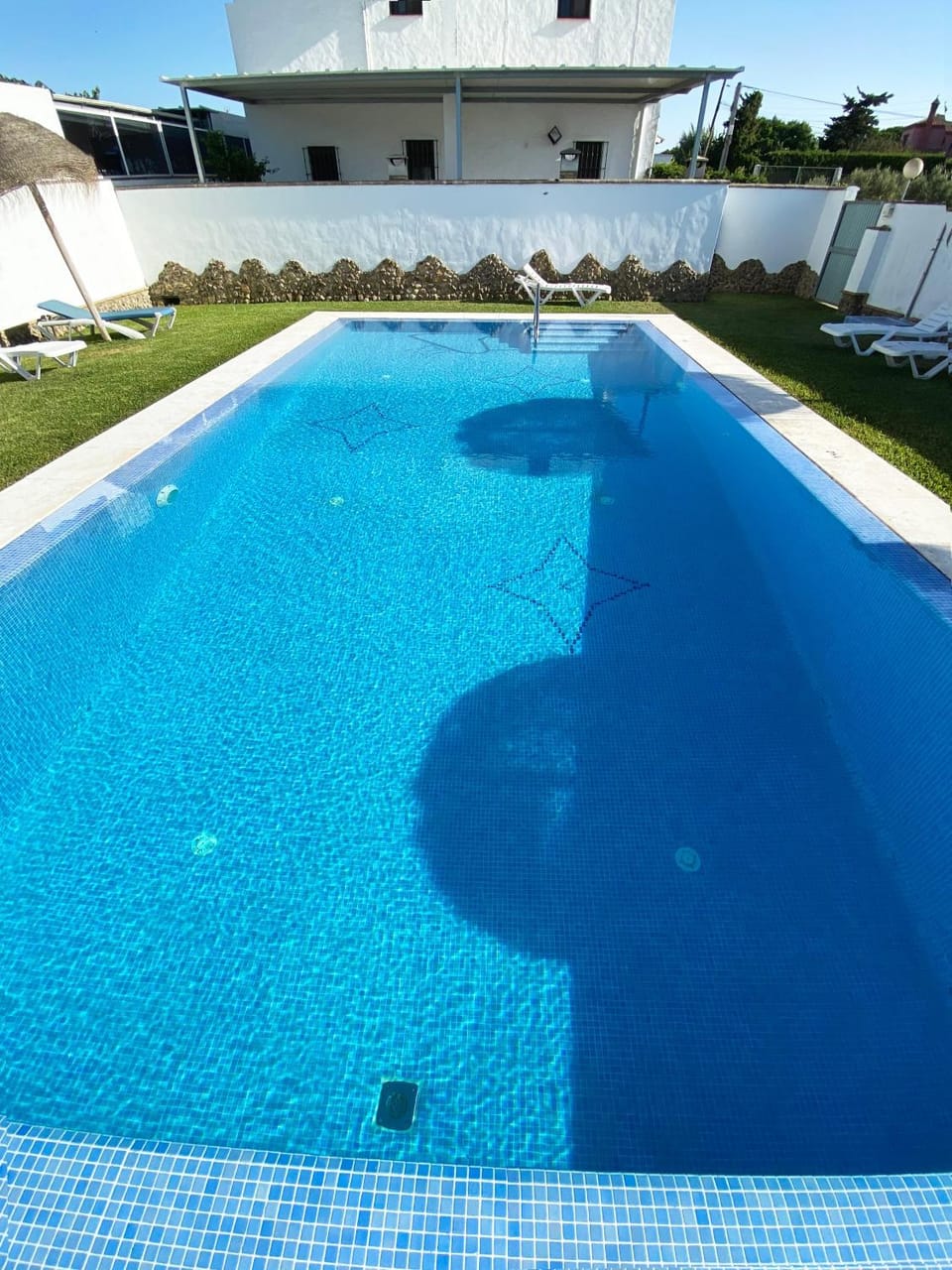 Property building, Living room, Swimming pool