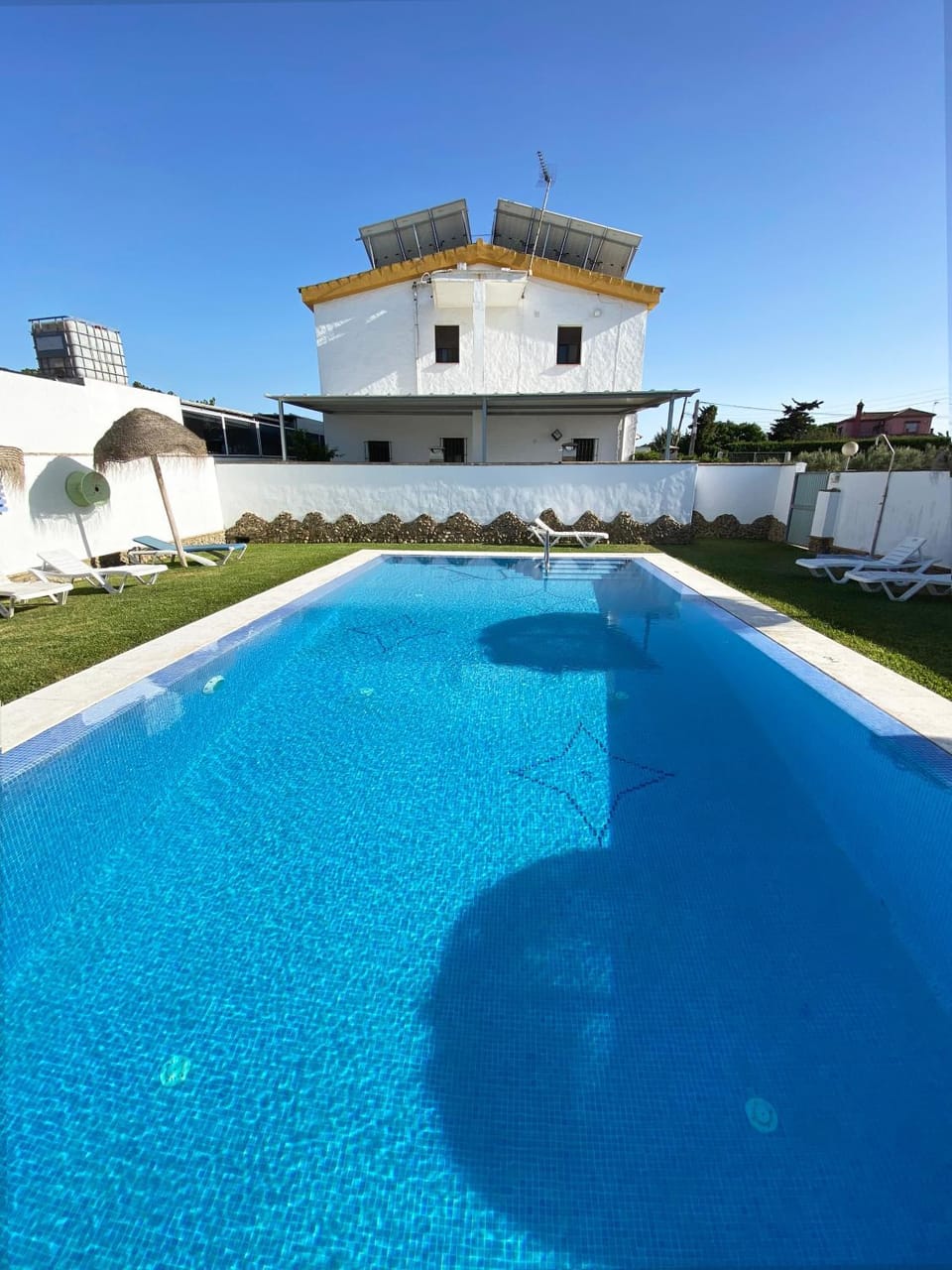 Property building, Living room, Swimming pool