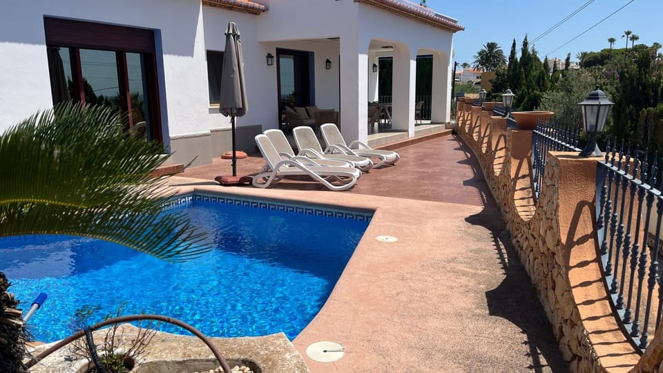 Property building, Living room, Swimming pool