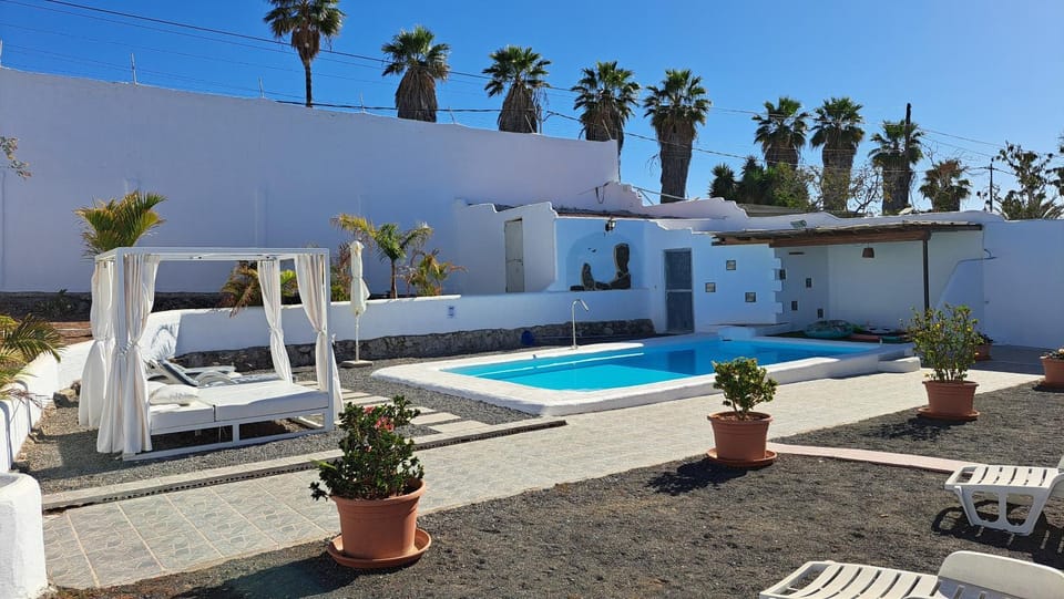 Property building, Living room, Swimming pool