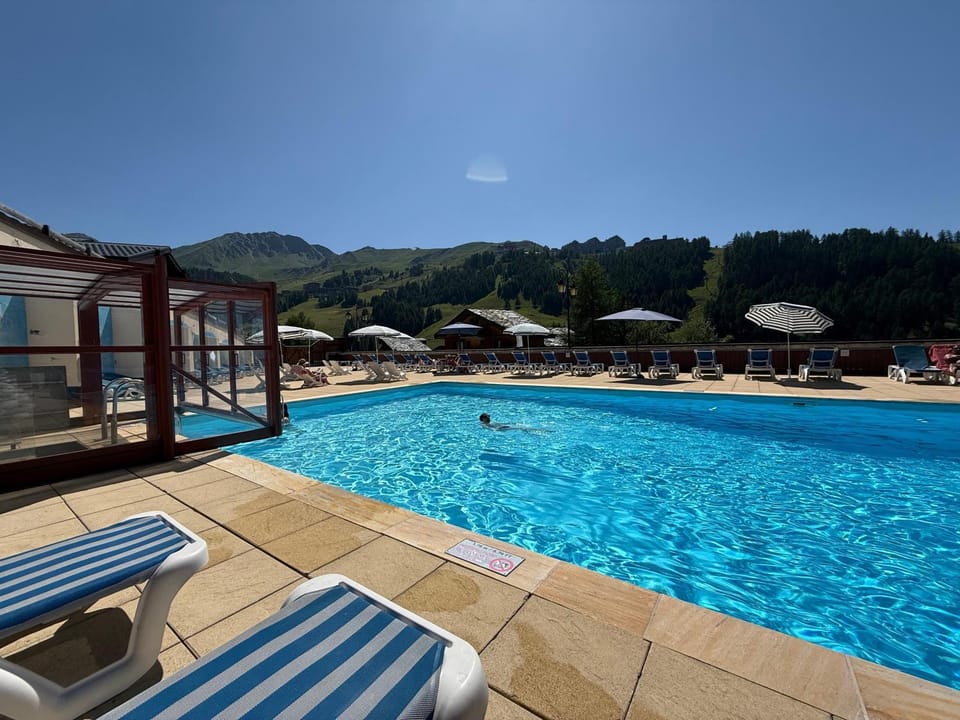 Property building, Living room, Swimming pool