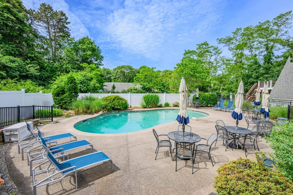 Pool and tennis court close to Craigville Beach House in Centerville