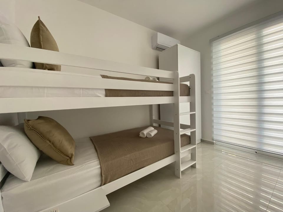 bunk bed, wardrobe, air conditioner