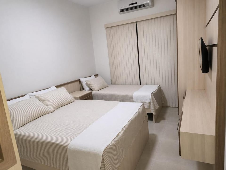 Estadia & Conforto - Ar, WiFi, Garagem, Praia 600m Apartment in Cabo Frio