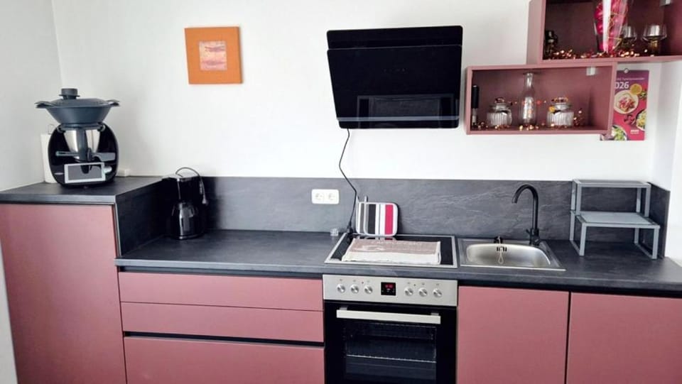 Kitchen or kitchenette, oven, stove