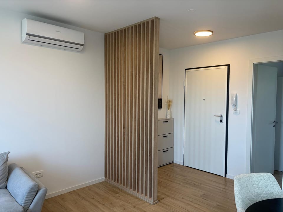 Living room, Lobby or reception, Seating area, air conditioner