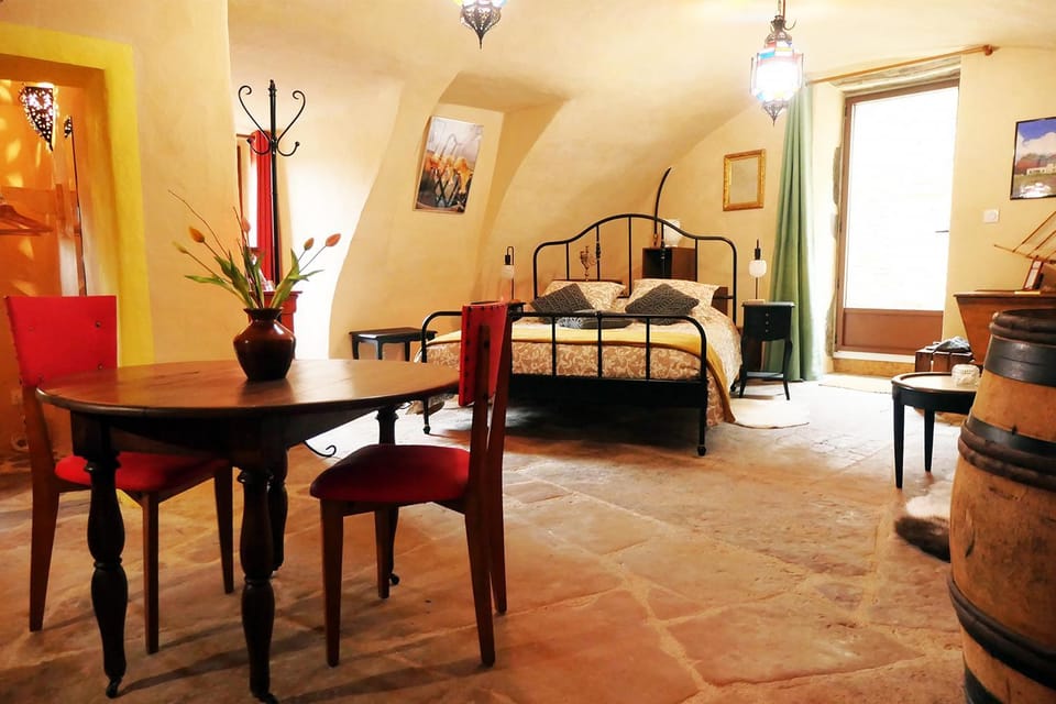 Bed, Living room, Seating area, Bedroom