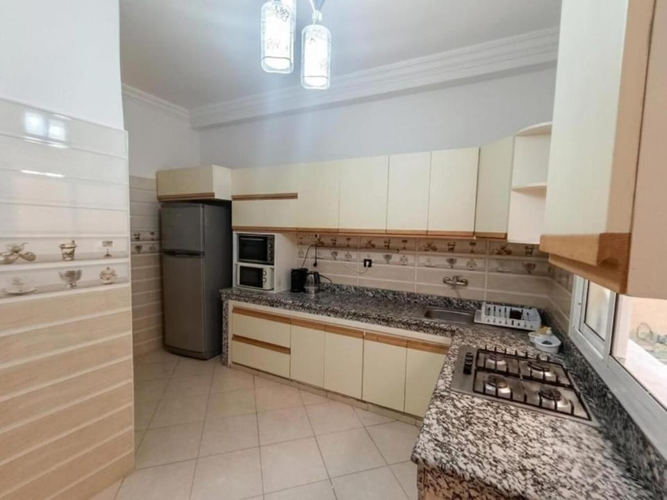 Kitchen or kitchenette, oven, stove
