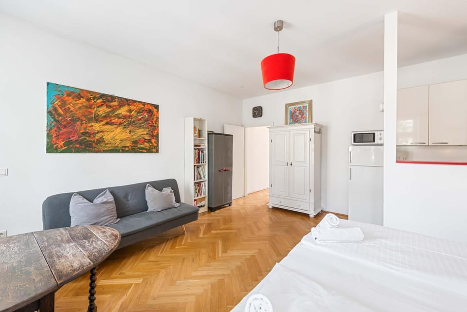Seating area, towels, wardrobe