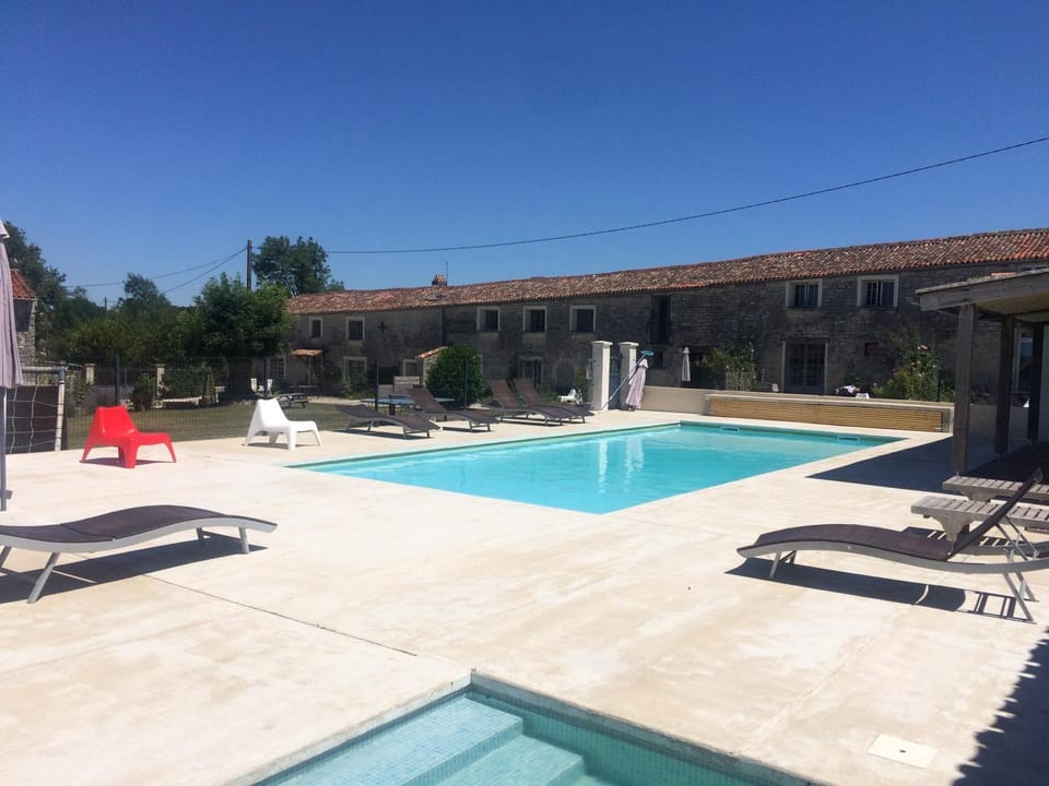 Property building, Living room, Swimming pool