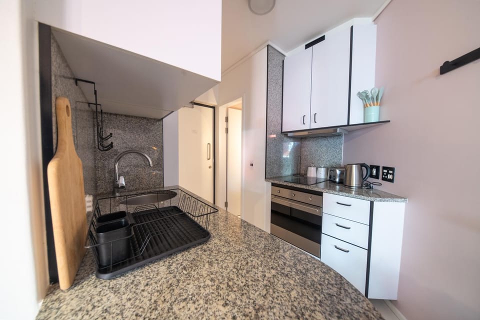 Kitchen or kitchenette, oven, stove