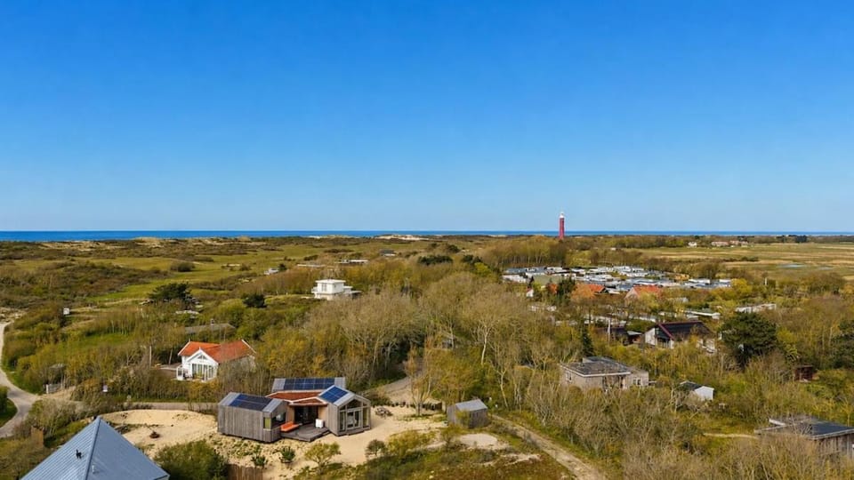 Luxe duinvilla met zwembad bij het strand House in Ouddorp