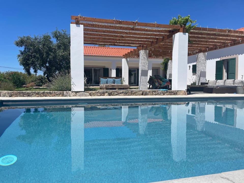 Property building, Living room, Swimming pool
