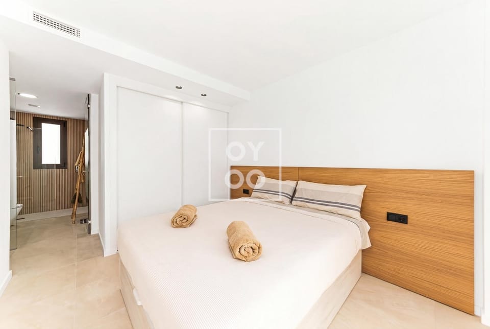 Bed, Bathroom, towels, wardrobe