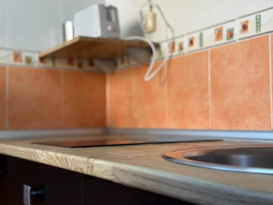 Kitchen or kitchenette, stove, kitchen