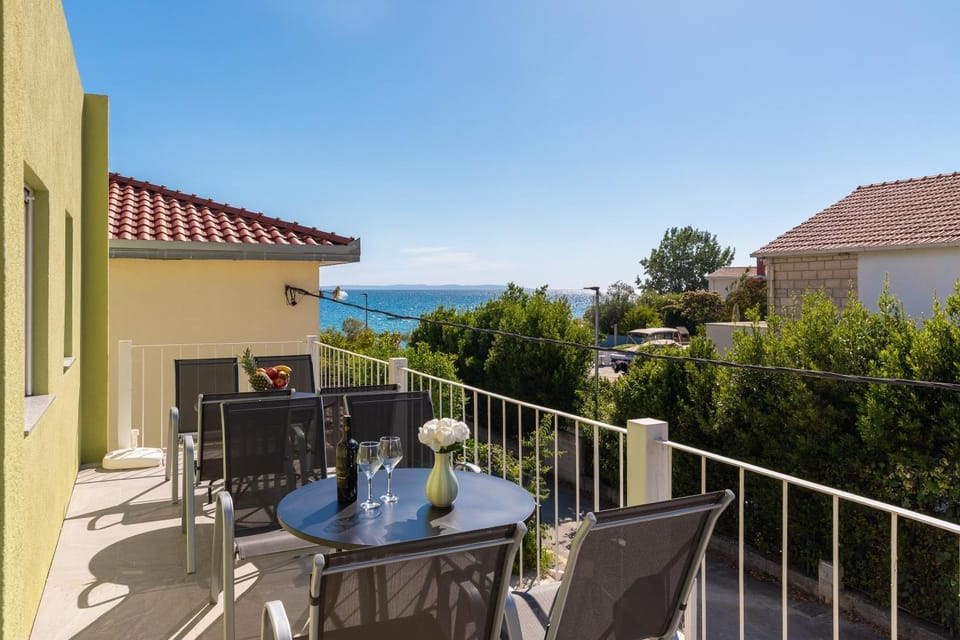 Property building, Day, Natural landscape, View (from property/room), Balcony/Terrace, Seating area, Dining area, Sea view