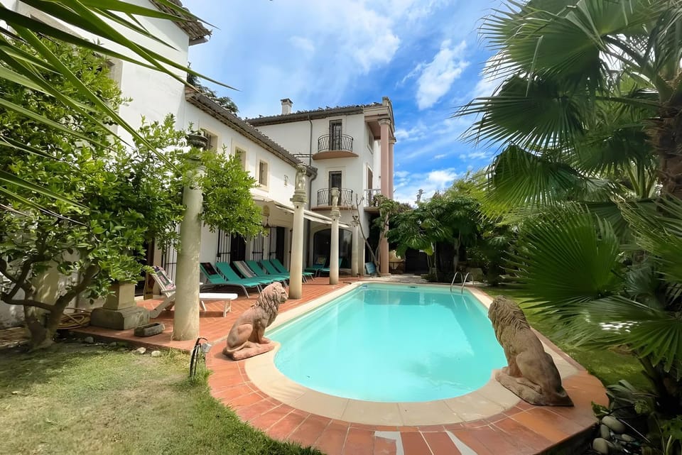 Property building, Living room, Swimming pool