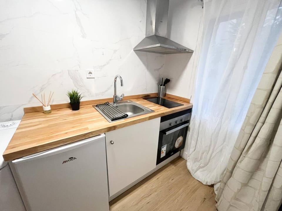 Kitchen or kitchenette, stove