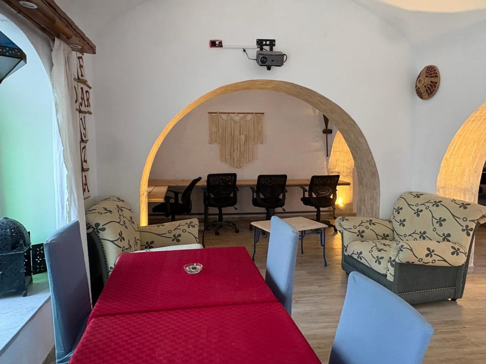 Bed, TV and multimedia, Living room, Seating area, Bedroom, air conditioner