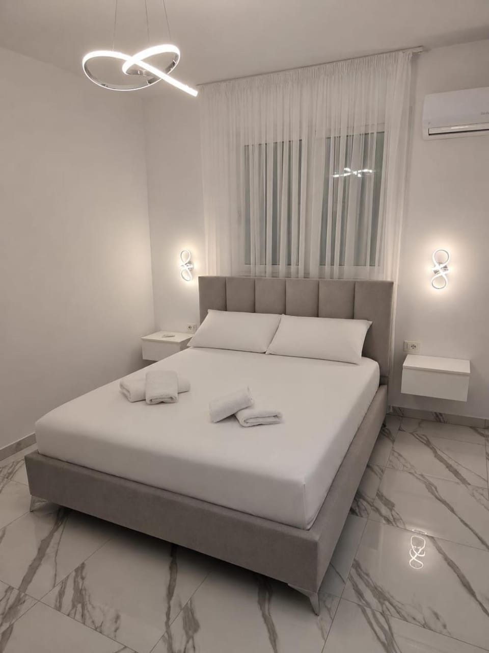 Bed, Photo of the whole room, Bedroom, towels, air conditioner