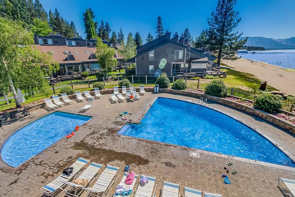 An all-season getaway near Heavenly with private beach access & a lakefront pool House in South Lake Tahoe