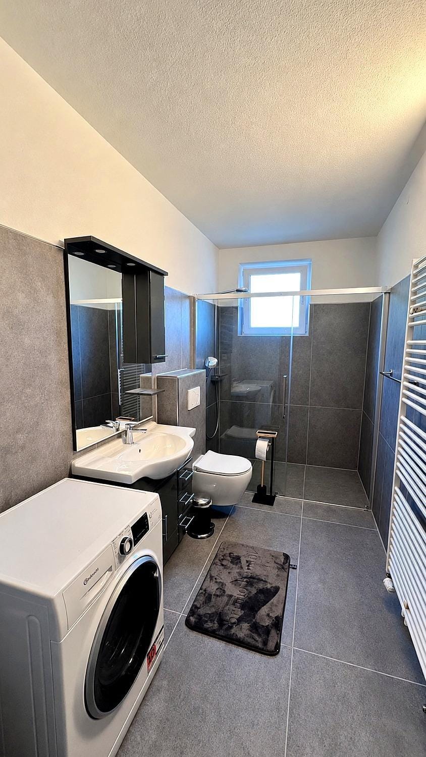 Bathroom, washing machine, dryer