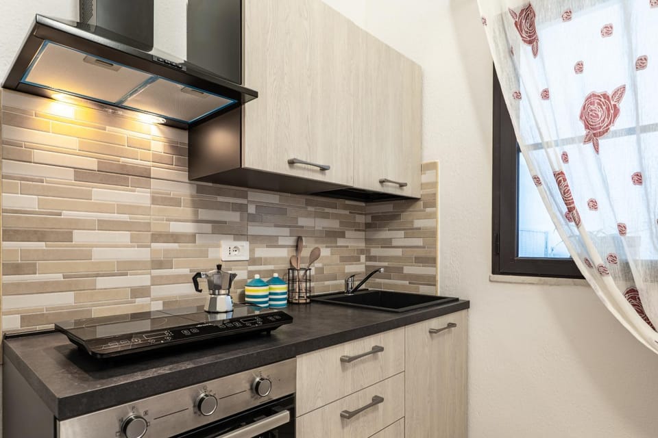 Kitchen or kitchenette, stove