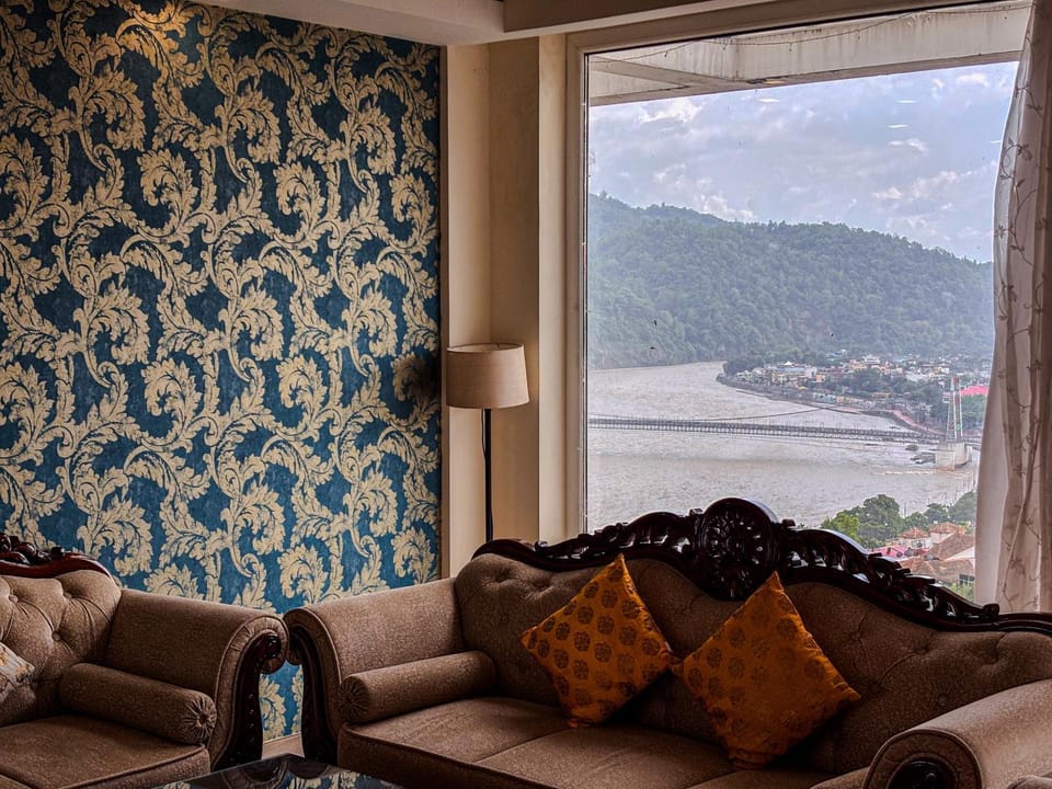 Living room, Seating area, Mountain view, River view