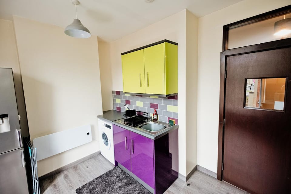 Kitchen or kitchenette, oven, stove, toaster