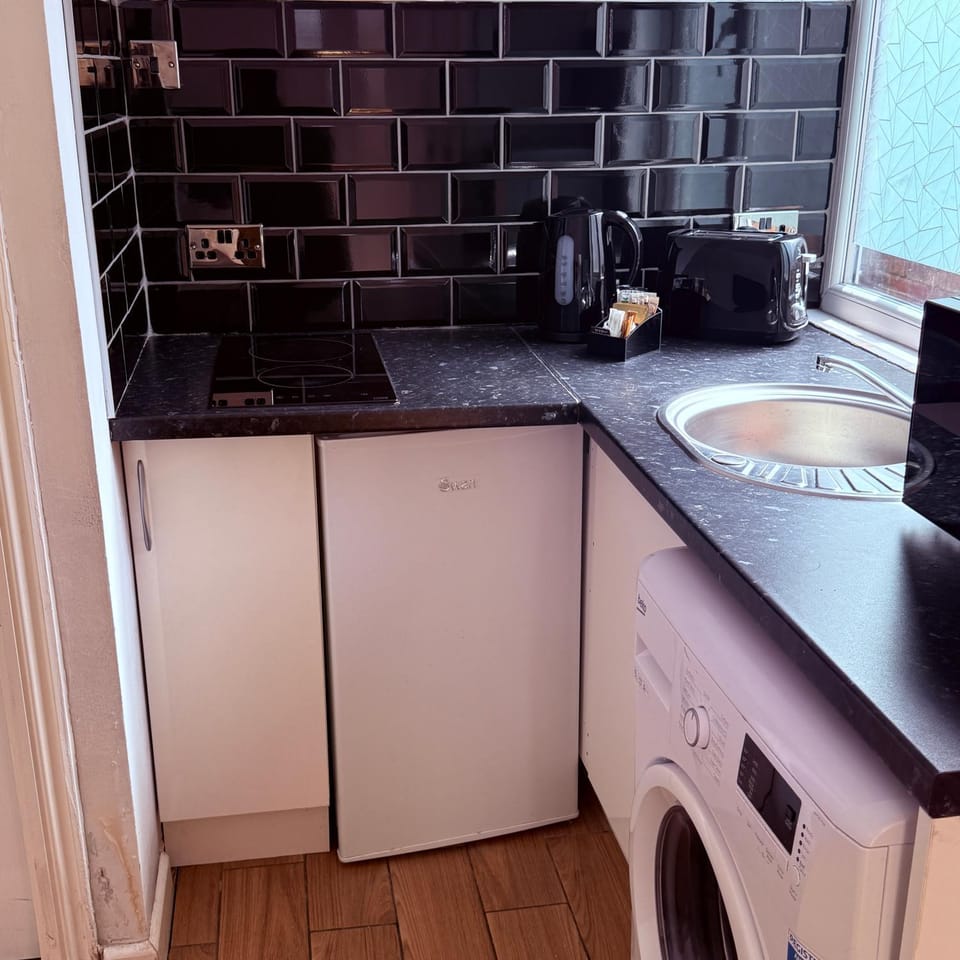 Kitchen or kitchenette, stove
