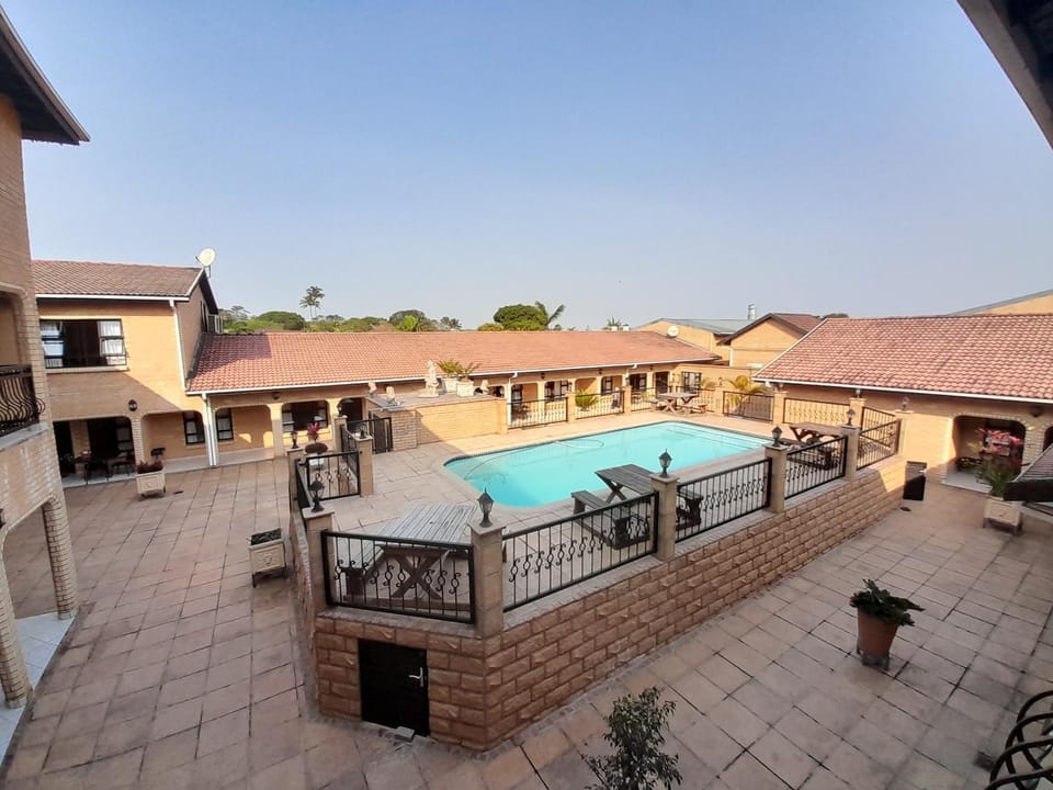 Property building, Patio, Day, View (from property/room), Balcony/Terrace, Pool view, Swimming pool