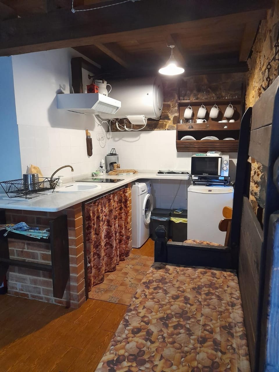 Kitchen or kitchenette, dishwasher, microwave, washing machine
