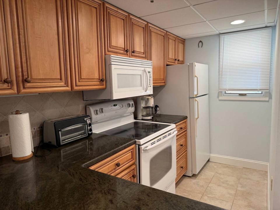 Kitchen or kitchenette, oven, stove, toaster