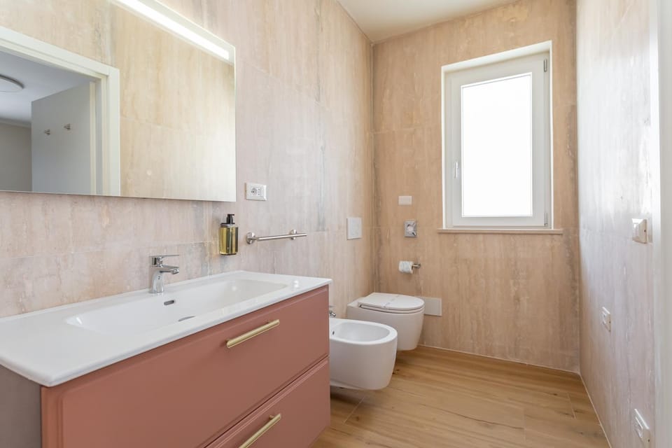Shower, Toilet, Bathroom, bidet, hair dryier, towels