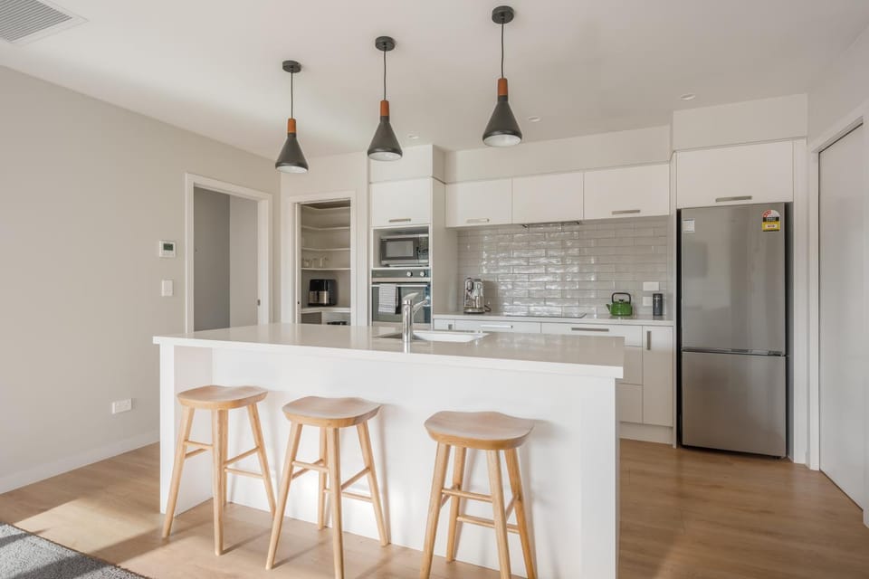 Kitchen or kitchenette, dishwasher, oven, stove, toaster