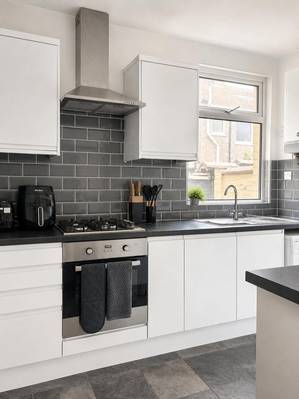 Kitchen or kitchenette, stove, toaster
