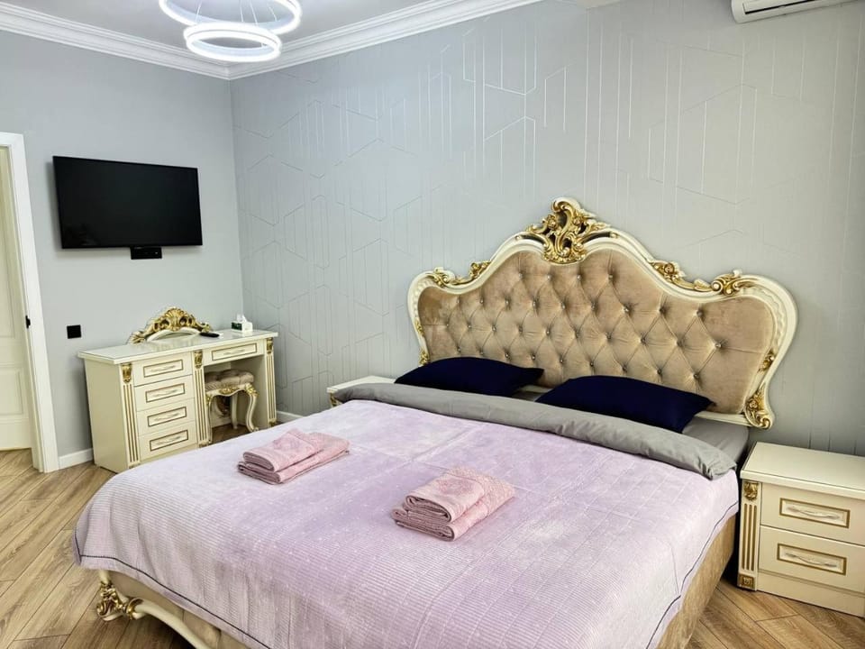 Bed, TV and multimedia, Bedroom, towels, wardrobe, air conditioner
