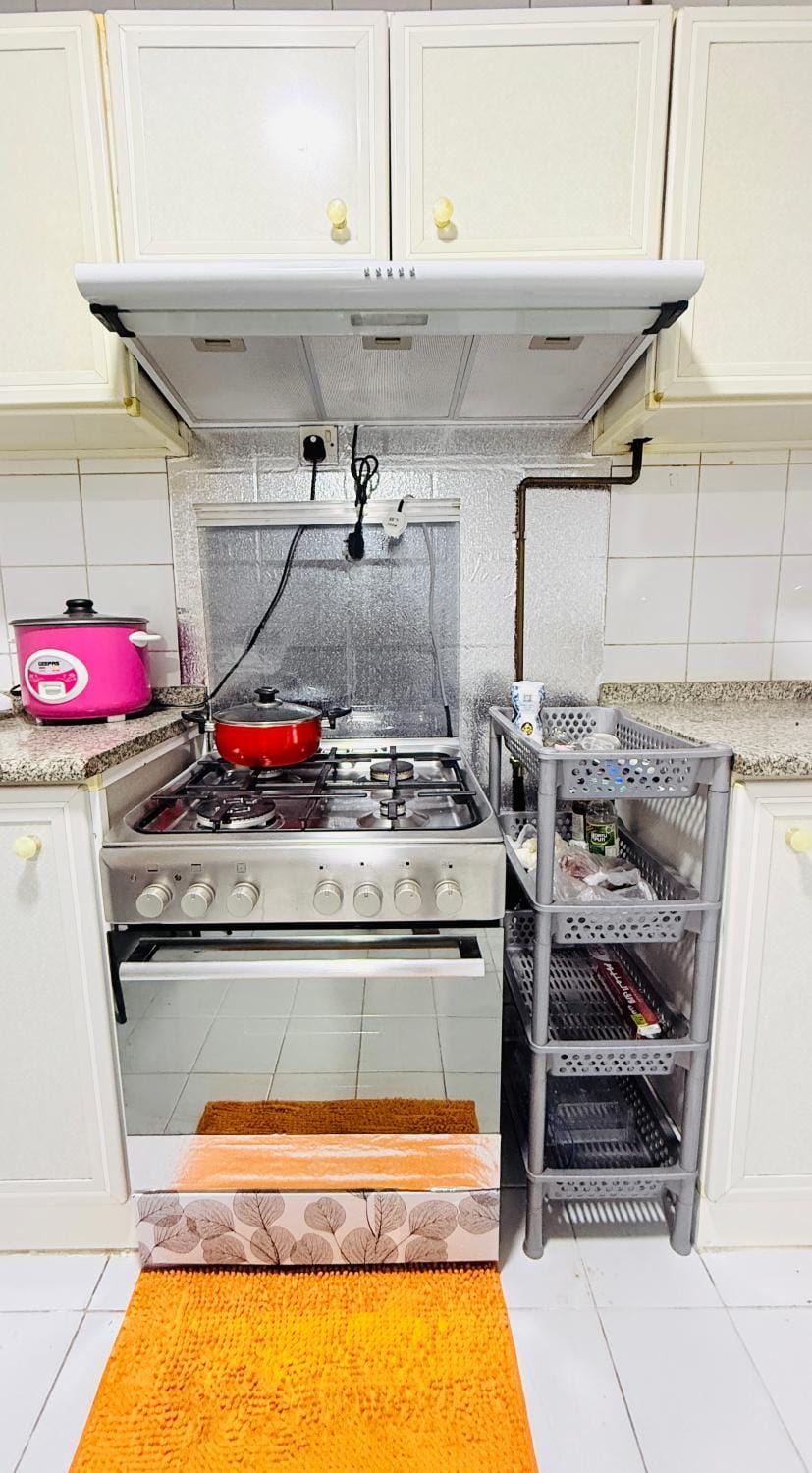 Kitchen or kitchenette, stove