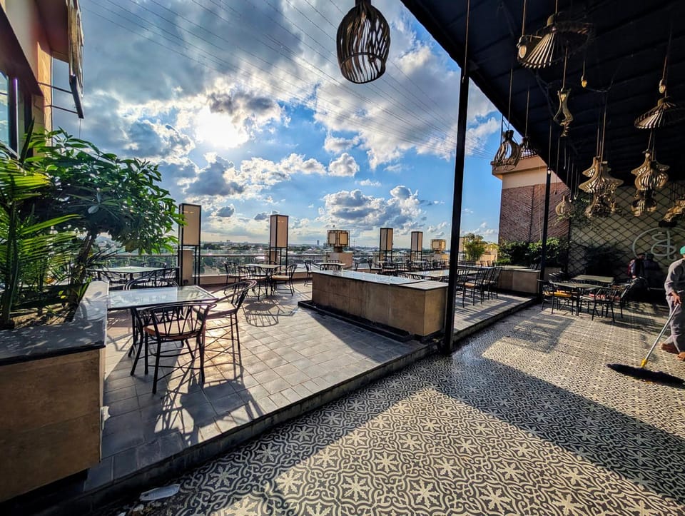 Property building, Patio, Communal lounge/ TV room, Day, View (from property/room), Balcony/Terrace, Living room, Seating area, Evening entertainment, City view