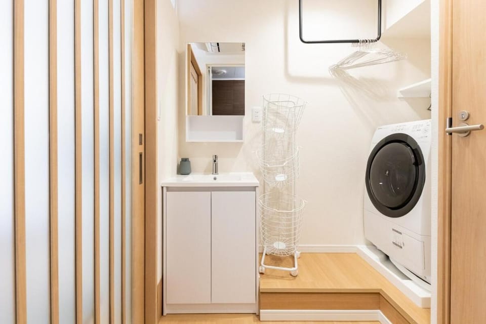 Bathroom, washing machine, dryer